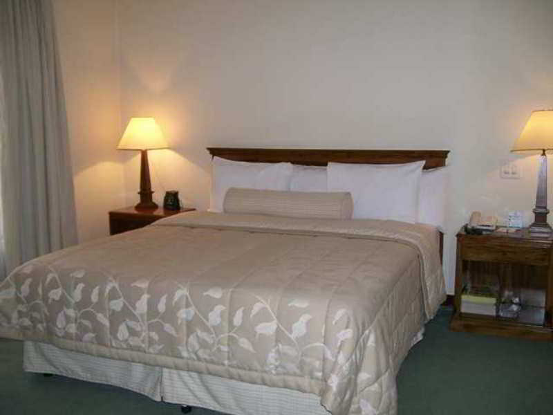 Embassy Suites By Hilton Bogota - Rosales Bilik gambar A bedroom at the hotel